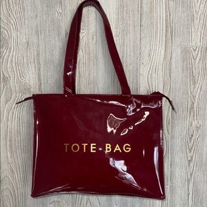 Glossy Red Tote Bag with Gold Lettering the perfect traveling bag